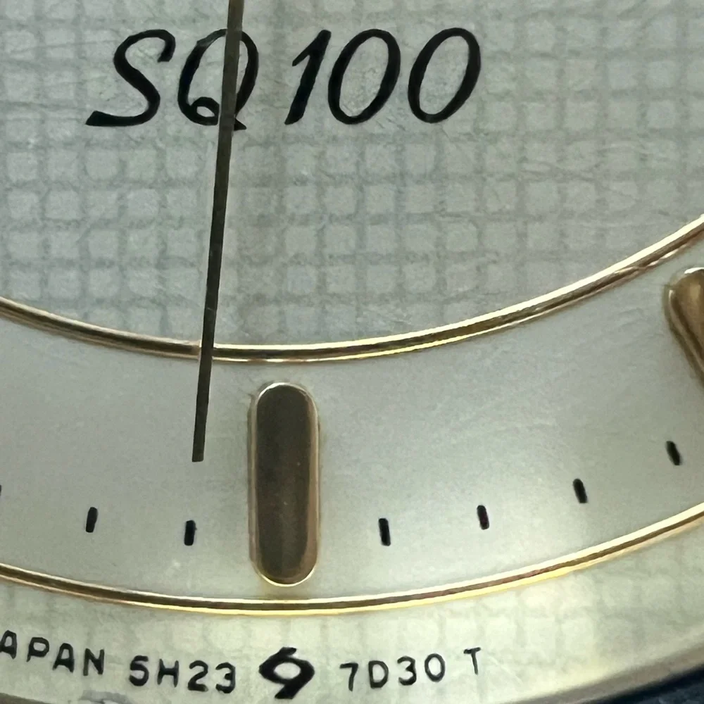 Seiko SQ 100 Rare Vintage Men’s Watch Light Gold-Tone Dial Two-Tone Bracelet